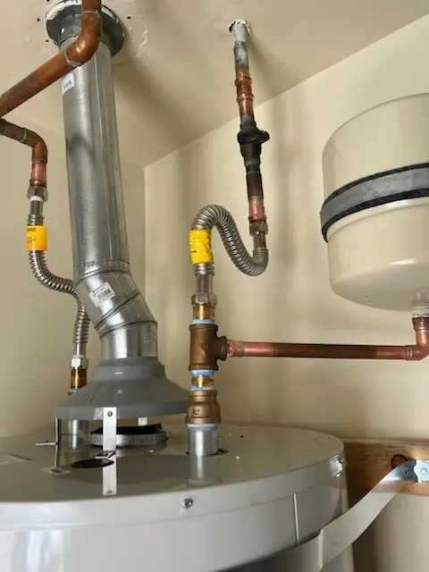 Water heater installation and plumbing repair in Roe Park